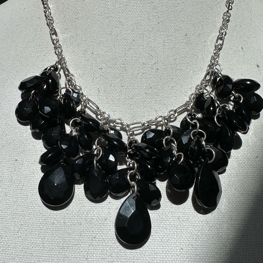 Silvertone and black drippy bead necklace